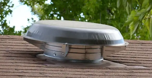 attic fan installation services with low-profile roof ventilation unit in San Antonio, TX