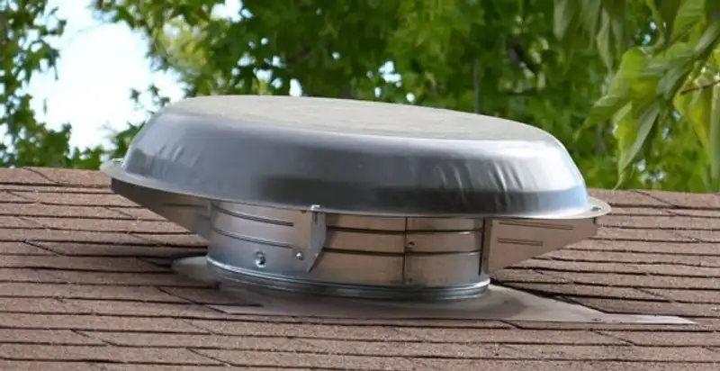 attic fan installation services with low-profile roof ventilation unit in San Antonio, TX