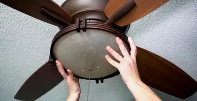 Ceiling fan repair and reinstallation on ceiling mount in San Antonio, TX