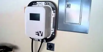 Electric car charger installation with wall-mounted EV charging station in San Antonio, TX