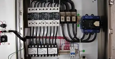 Electrical panel installation with organized circuit breakers and wiring in San Antonio, TX