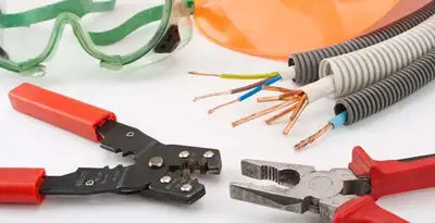 Electrical wiring repair with professional tools and safety equipment in Helotes, TX