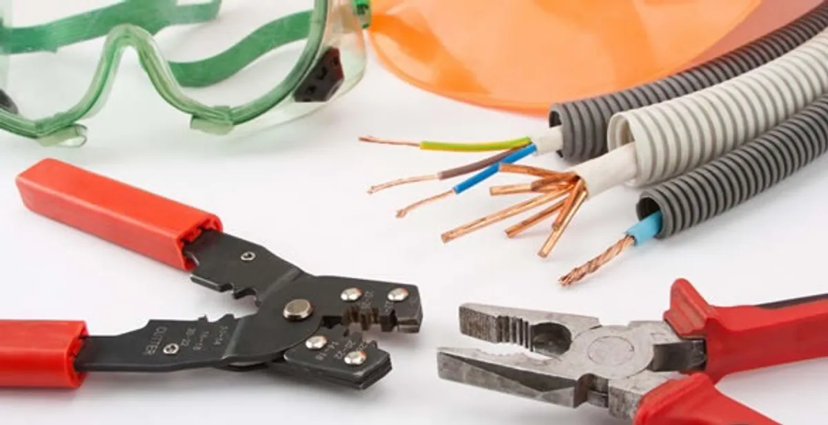 Electrical wiring repair with professional tools and safety equipment in Universal City, TX