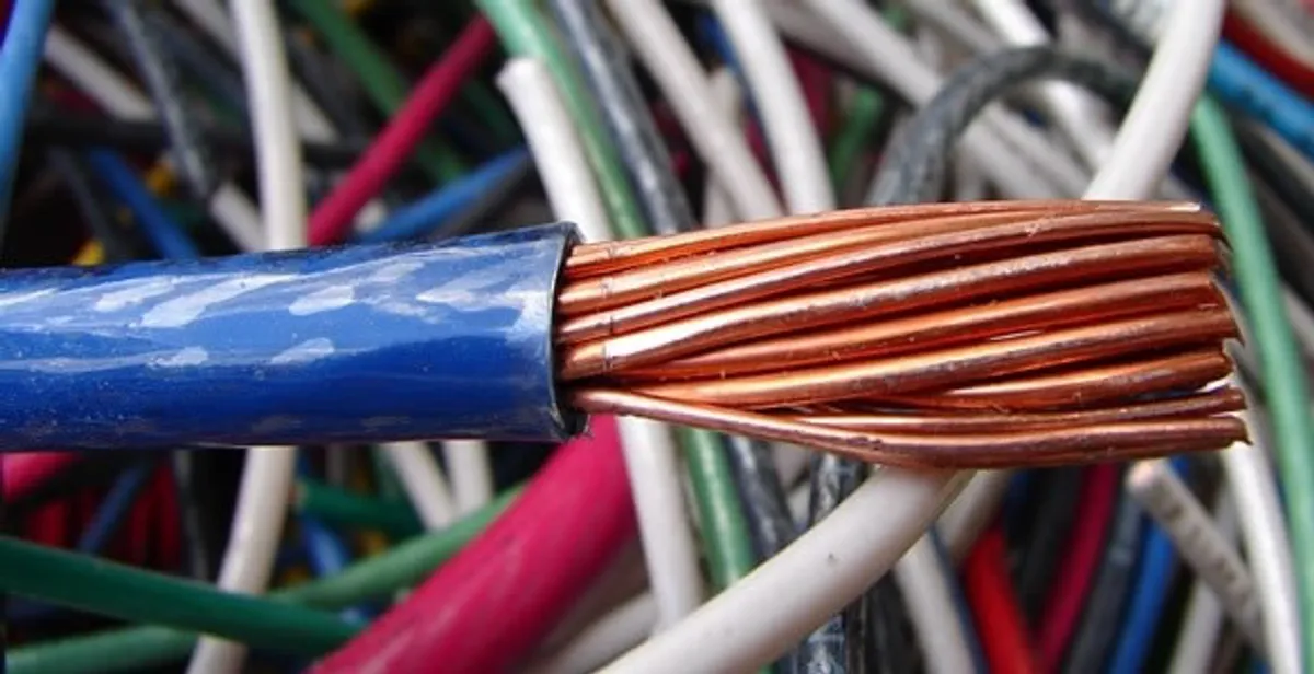 electrical wiring services showing exposed copper conductors and cable preparation in San Antonio, TX