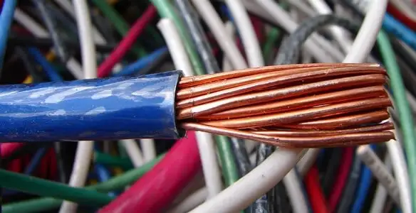 electrical wiring services showing exposed copper conductors and cable preparation in San Antonio, TX