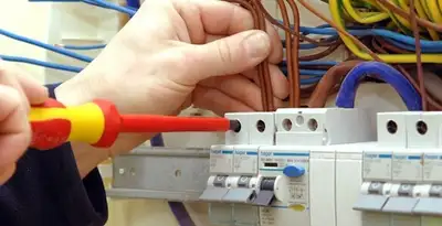 electrician services performing professional electrical panel wiring and connections in San Antonio, TX