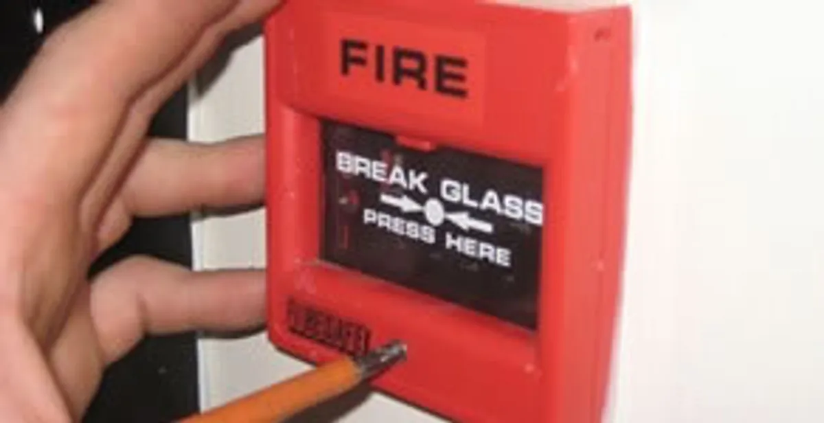 fire alarm installation service showing manual fire alarm pull station installed by licensed electricians in San Antonio, TX