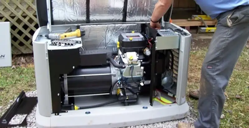 generator installation service showing technician connecting and configuring generator components in San Antonio, TX