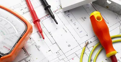 licensed electrician planning and testing electrical systems using professional tools in San Antonio, TX