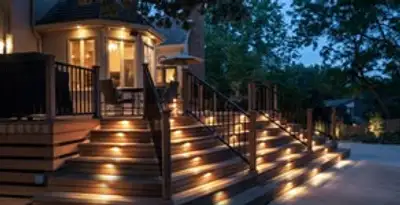 Residential electrician installing outdoor lighting for home safety in San Antonio, TX